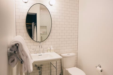 Room, 1 King Bed (Cisneros) | Bathroom | Shower, free toiletries, towels