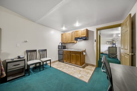 Suite, 2 Queen Beds, Kitchenette | Private kitchenette | Fridge, microwave, coffee/tea maker