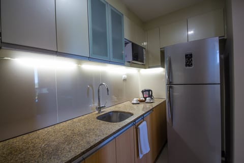 Full-size fridge, microwave, stovetop, electric kettle