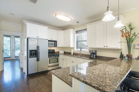 Large kitchen with granite counter tops and stainless appliances