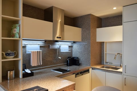 Junior Suite, 1 King Bed | Private kitchen | Fridge, microwave, oven, stovetop