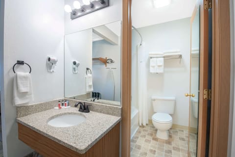 Room, 2 Queen Beds, Non Smoking | Bathroom | Combined shower/tub, free toiletries, hair dryer, towels