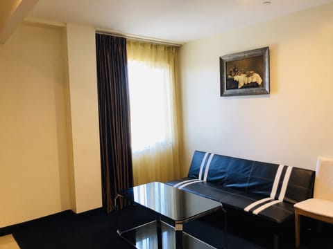 Family Suite, 2 Queen Beds, Kitchenette | Desk, iron/ironing board, free WiFi, bed sheets