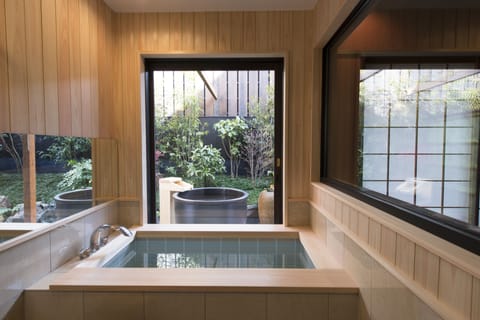 Koubai | Bathroom | Combined shower/tub, deep soaking tub, designer toiletries, hair dryer