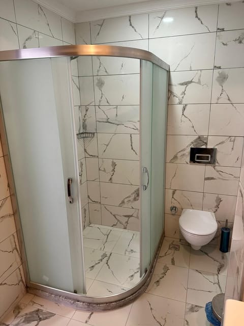 Luxury Triple Room, Sea View | Bathroom | Shower, eco-friendly toiletries, hair dryer, slippers
