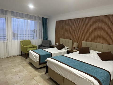 Luxury Triple Room, Sea View | Premium bedding, desk, laptop workspace, soundproofing