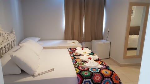 Family Room | Minibar, iron/ironing board, free WiFi, bed sheets