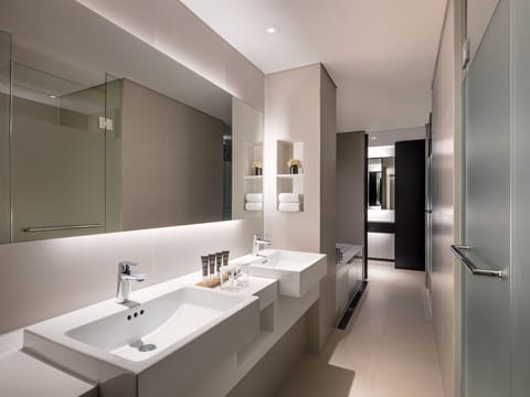 Premier Suite, 1 King Bed | Bathroom | Shower, rainfall showerhead, eco-friendly toiletries, hair dryer