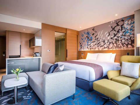 Junior Suite, 1 King Bed | Premium bedding, down comforters, in-room safe, individually decorated