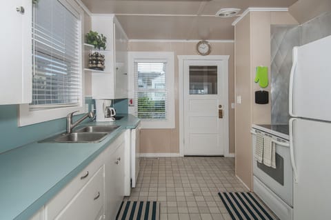 Kitchen looking toward entry.