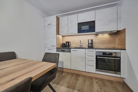 Full-size fridge, microwave, coffee/tea maker, electric kettle