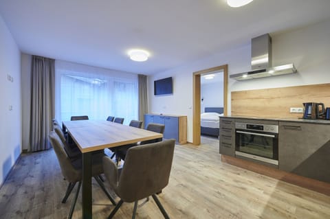 Apartment, 4 Bedrooms | Living area | Smart TV, heated floors, offices