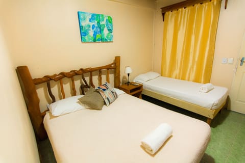 Family Room, Multiple Beds | Iron/ironing board, rollaway beds, free WiFi, bed sheets