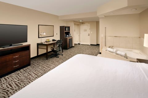 Room, 1 King Bed, Jetted Tub | In-room safe, desk, laptop workspace, blackout drapes