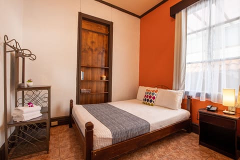 Comfort Room - Shared Bathroom | Blackout drapes, iron/ironing board, free WiFi, bed sheets