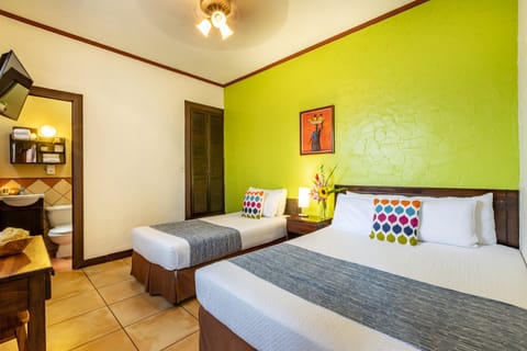 Deluxe Room, Private Bathroom | Blackout drapes, iron/ironing board, free WiFi, bed sheets