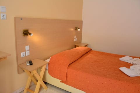 Basic Double Room, 1 Double or 2 Twin Beds, Ground Floor | In-room safe, blackout drapes, iron/ironing board, free WiFi