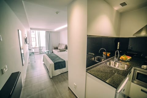 Studio, Balcony | Private kitchenette | Fridge, microwave, stovetop, coffee/tea maker