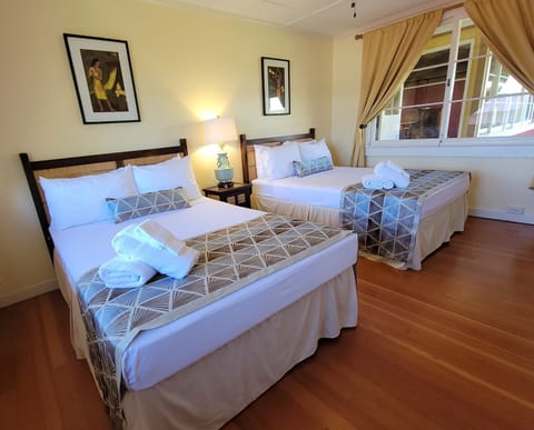 Room, 2 Bedrooms - 1 Queen Bed and 2 Double Bed  | Blackout drapes, free WiFi, bed sheets