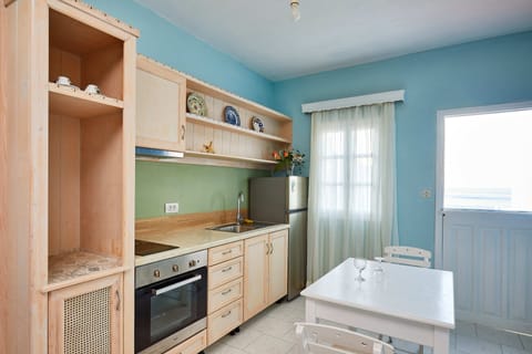 Apartment | Private kitchen | Fridge, stovetop, electric kettle, cookware/dishes/utensils