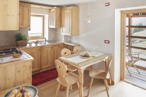 Apartment, 1 Bedroom, Lake View | Private kitchen | Fridge, stovetop, electric kettle, cookware/dishes/utensils