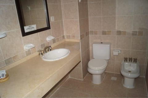 Combined shower/tub, free toiletries, hair dryer, bathrobes