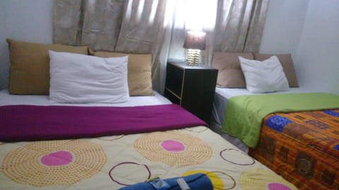 Double Room | Down comforters, individually furnished, blackout drapes, free WiFi