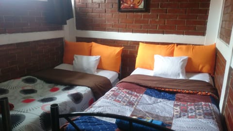 Traditional Double Room Single Use, 2 Bedrooms, Smoking | Down comforters, individually furnished, blackout drapes, free WiFi