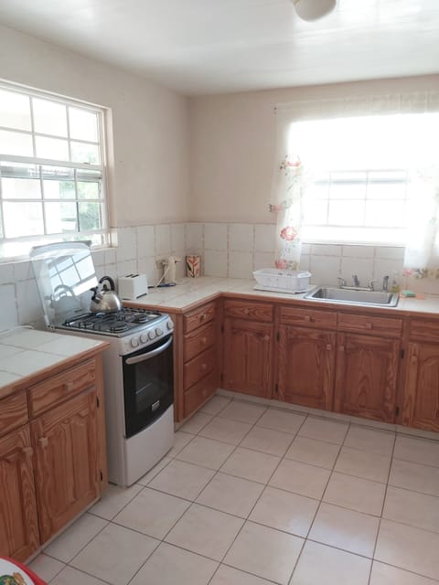 Apartment, 2 Bedrooms | Private kitchen | Fridge, microwave, oven, stovetop