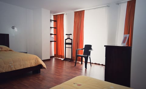 Quadruple Room | Minibar, desk, iron/ironing board, free WiFi