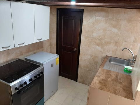 Basic Suite, 2 Bedrooms | Private kitchen | Fridge, oven, stovetop, electric kettle