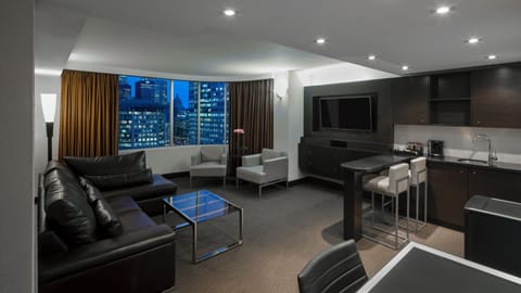 Deluxe Suite, 1 King Bed, City View | Living area | 47-inch LED TV with digital channels, TV, streaming services