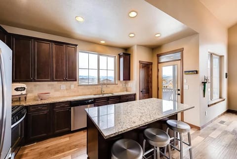 Chef's kitchen with walkout to deck.