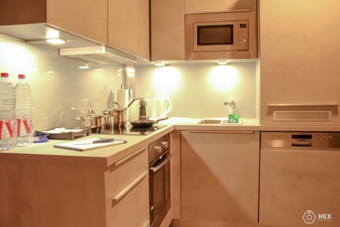 Superior Penthouse, 3 Bedrooms, Balcony | Private kitchen | Full-size fridge, microwave, oven, stovetop