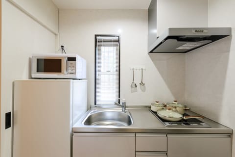 Apartment House | Private kitchenette | Fridge, microwave, stovetop, electric kettle