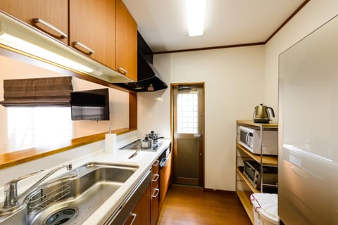 Apartment House | Private kitchenette | Fridge, microwave, stovetop, electric kettle