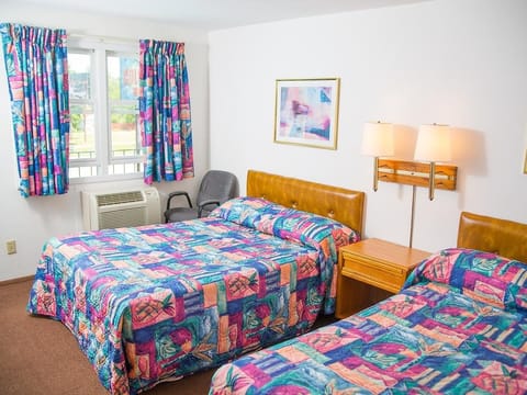 Room, 2 Queen Beds | Individually decorated, free WiFi, bed sheets