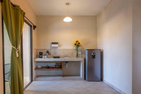 Standard King Room | Private kitchen | Fridge, microwave, electric kettle, cookware/dishes/utensils