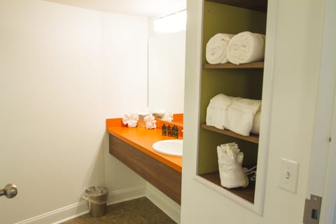 Deluxe Suite, 2 Double Beds, Pool View | Bathroom | Free toiletries, hair dryer, towels, soap