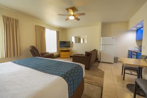 Suite, 1 Queen Bed, Kitchen | Desk, iron/ironing board, rollaway beds, free WiFi