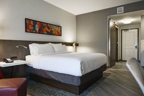 Desk, laptop workspace, blackout drapes, iron/ironing board