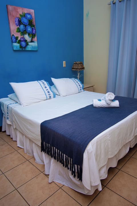 Double Room | Minibar, blackout drapes, free WiFi, bed sheets