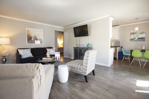 Contemporary style living space with 48” Smart TV