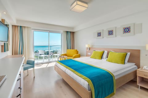Standard Room, Partial Sea View | Premium bedding, free minibar items, desk, laptop workspace