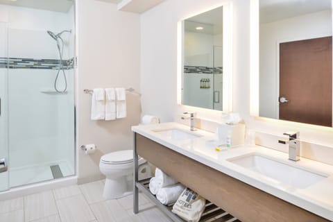 Designer toiletries, hair dryer, towels, soap