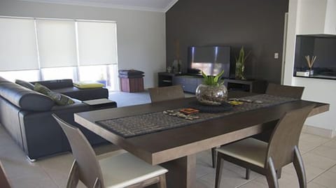 Comfort Penthouse, 2 Bedrooms, Ocean View, Beachside | Living area | Flat-screen TV, DVD player