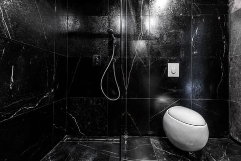 Black Superior Loft | Bathroom | Combined shower/tub, deep soaking tub, free toiletries, hair dryer