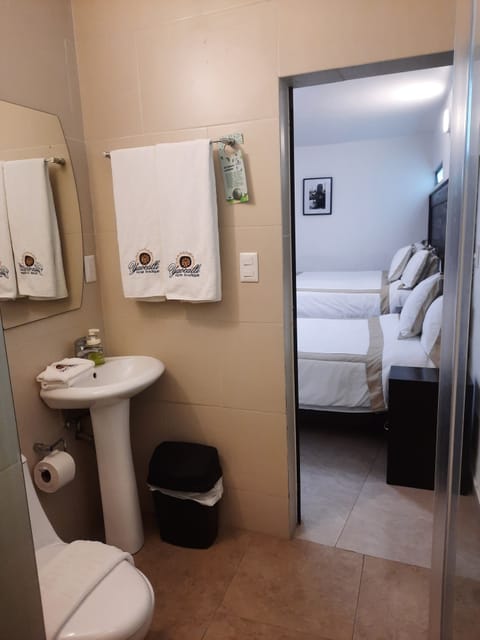 Shower, rainfall showerhead, free toiletries, hair dryer