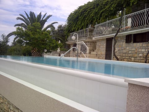 House front of Villa Sonia & Teo with a pool