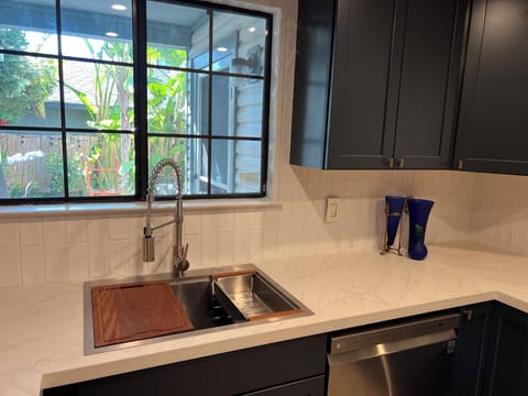 kitchen is fully equipped with various small appliances and all you need